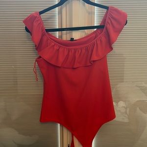 Women’s orange ruffle bodysuit